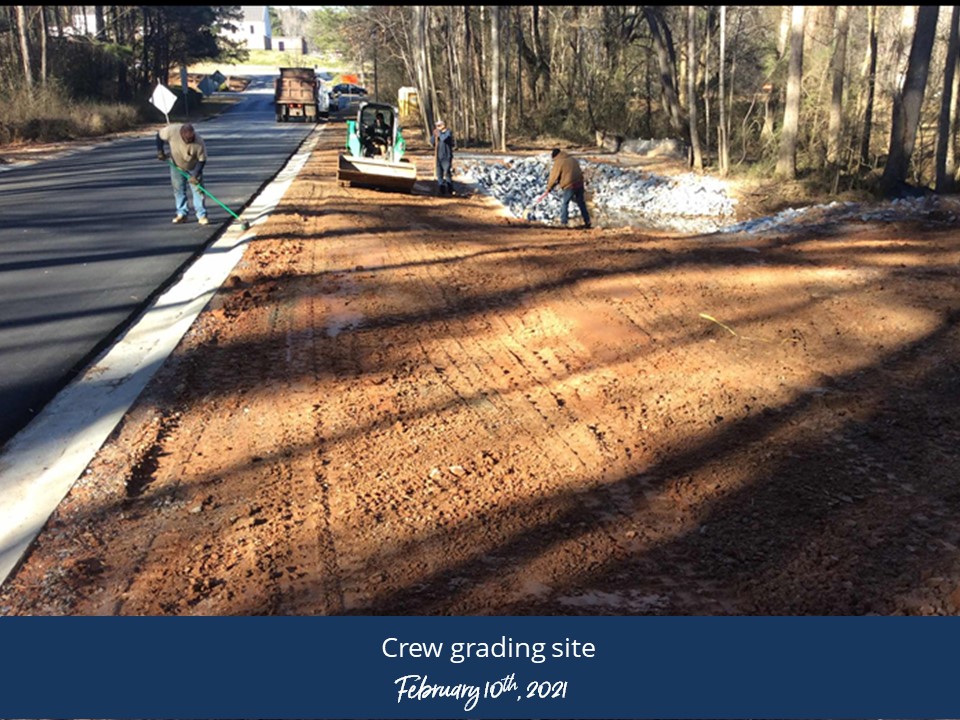 Crews working on a road during the day
